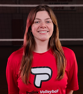 Portrait of Rachel Hodges, smiling, in a red Prolink shirt.