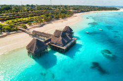 aerial-view-of-beautiful-hotel-on-the-water-in-oce-2022-02-08-22-39-24-utc