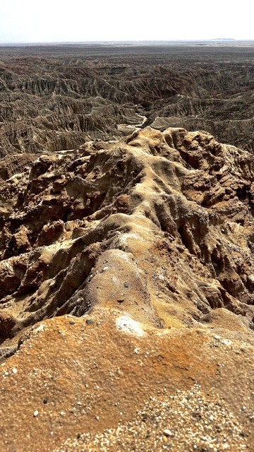 Eroded badlands ridge stretching to the horizon