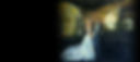 A painting of a wedding couple looking at each other in a dark room