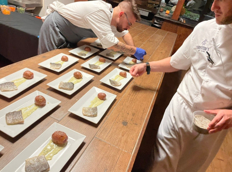 Chefs Preparing Dinner Plates