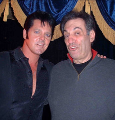 Paul with Larry Geller, Elvis's close freind and hairdresser.