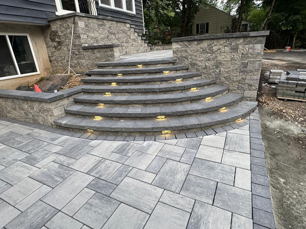 Curved stone steps with lights