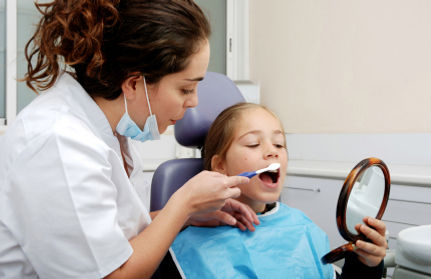 iStock_000004700087XSmall-kid-dentist.jpg