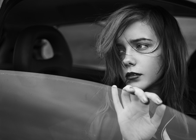 Sad Girl in the Window
