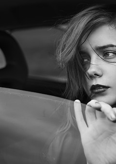 Sad Girl in the Window