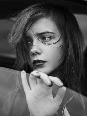 Sad Girl in the Window
