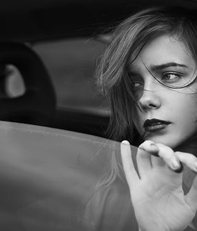 Sad Girl in the Window