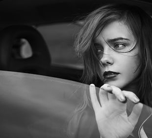 Sad Girl in the Window