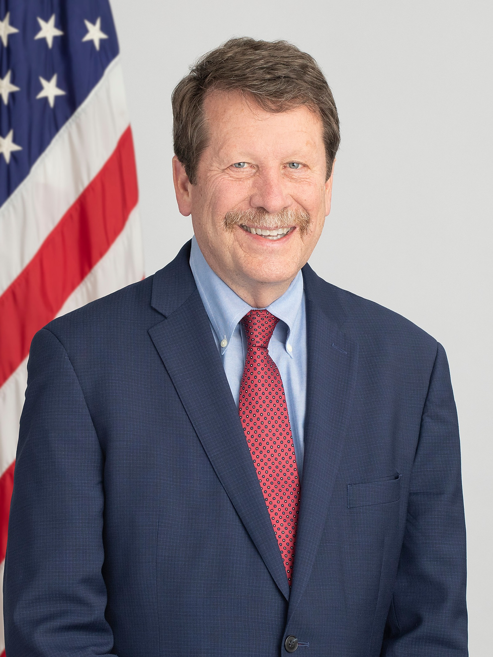 a man in a suit and tie