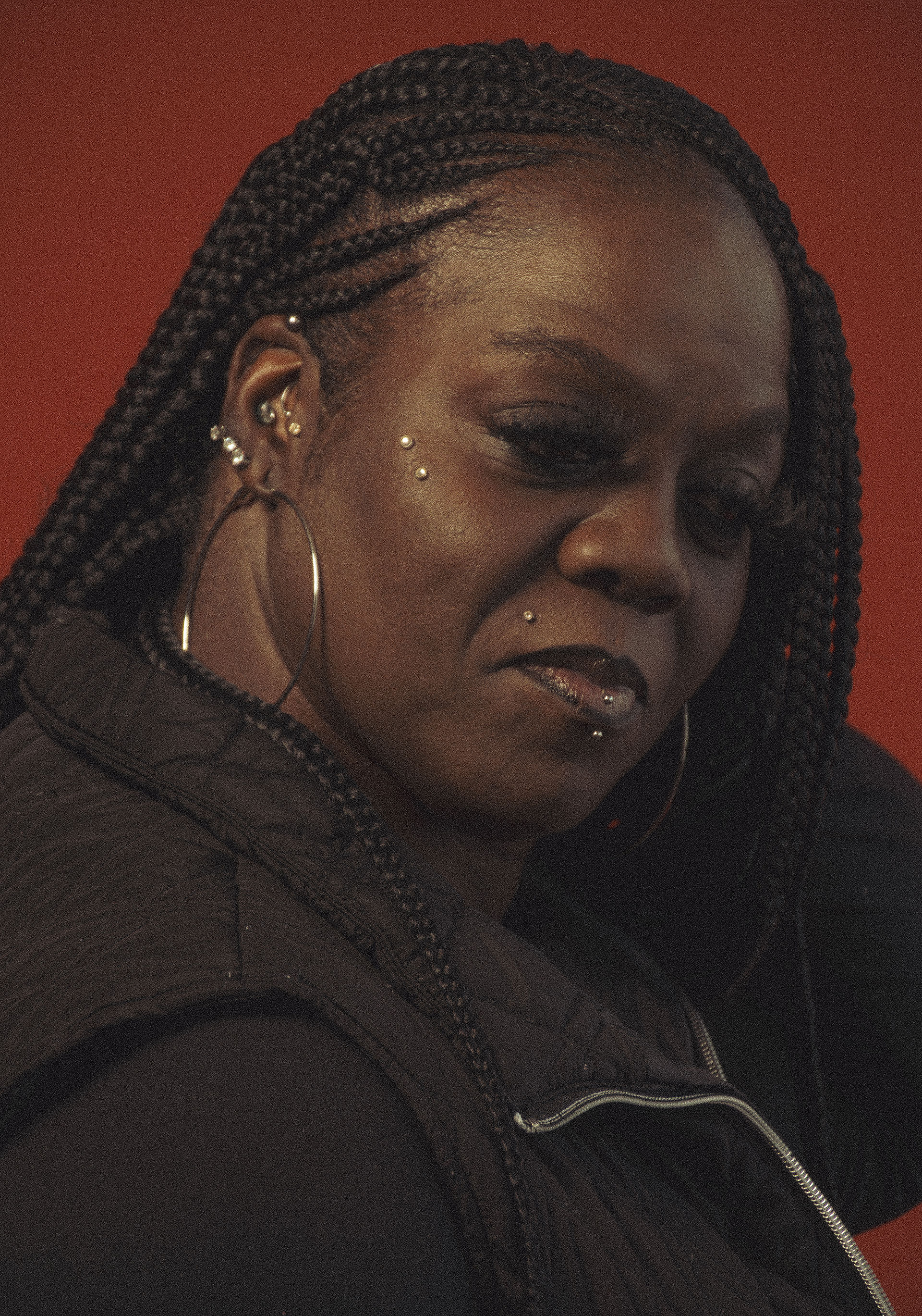 Black women slightly glancing at camera up close