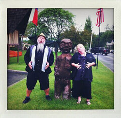 Fans posing with the Lumpy tiki at the Tiki Resort