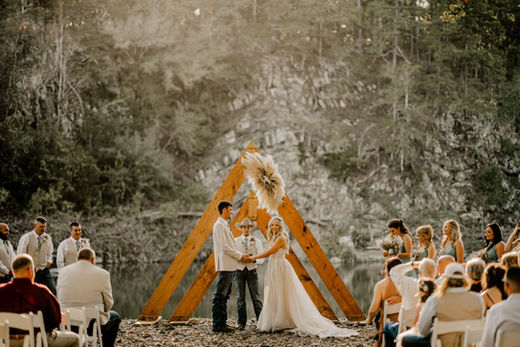 Wedding on River Bank at Last Wild River Lodge and Venue