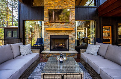 Outdoor Living Area, Fire Place and mounted Large Screen TV at Gypsy Soul