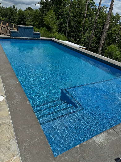 A Pool and Outdoor living space designed and installed by Arklahoma Pools, Spas & Outdoor Living