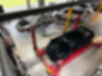 Eye-level view of a modern automotive workshop with advanced diagnostic equipment