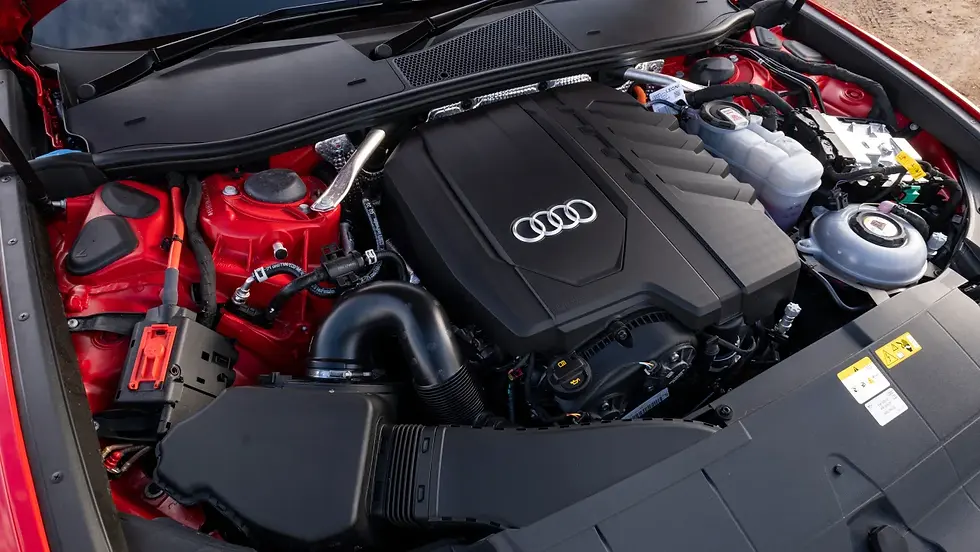 Close-up view of Audi engine compartment showing advanced mechanical parts