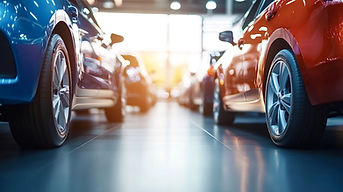 vecteezy_new-cars-sitting-in-dealership-showroom-ready-for-sale_57502604.jpg