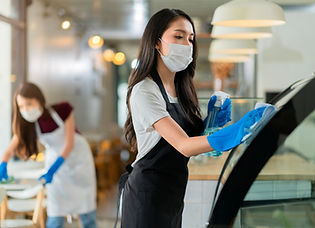 attractive-positive-young-asian-woman-staff-uniform-apron-spraying-detergent-alcohol-count