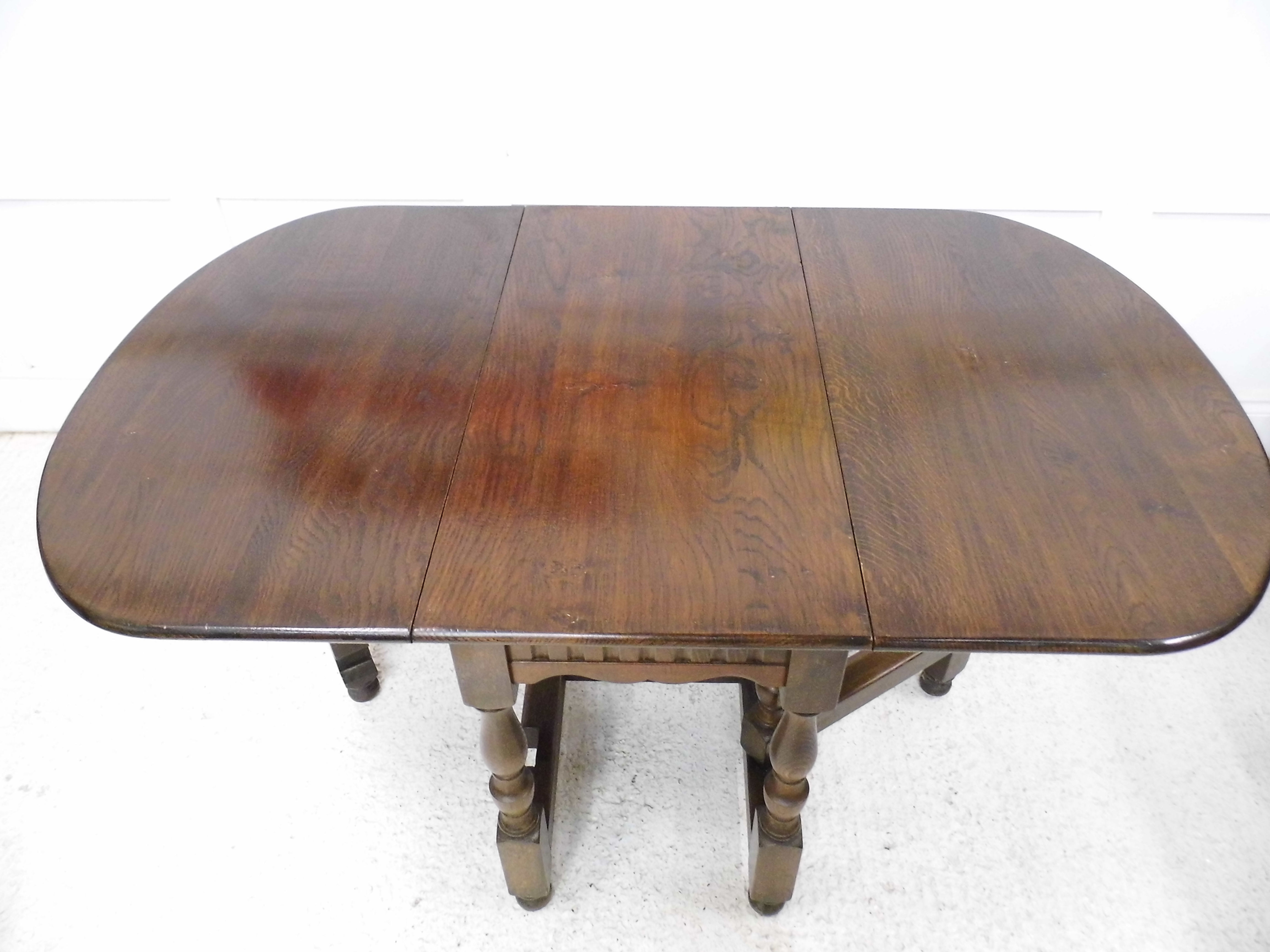 Antique Oak Extending drop leaf dining table solid plank slab top