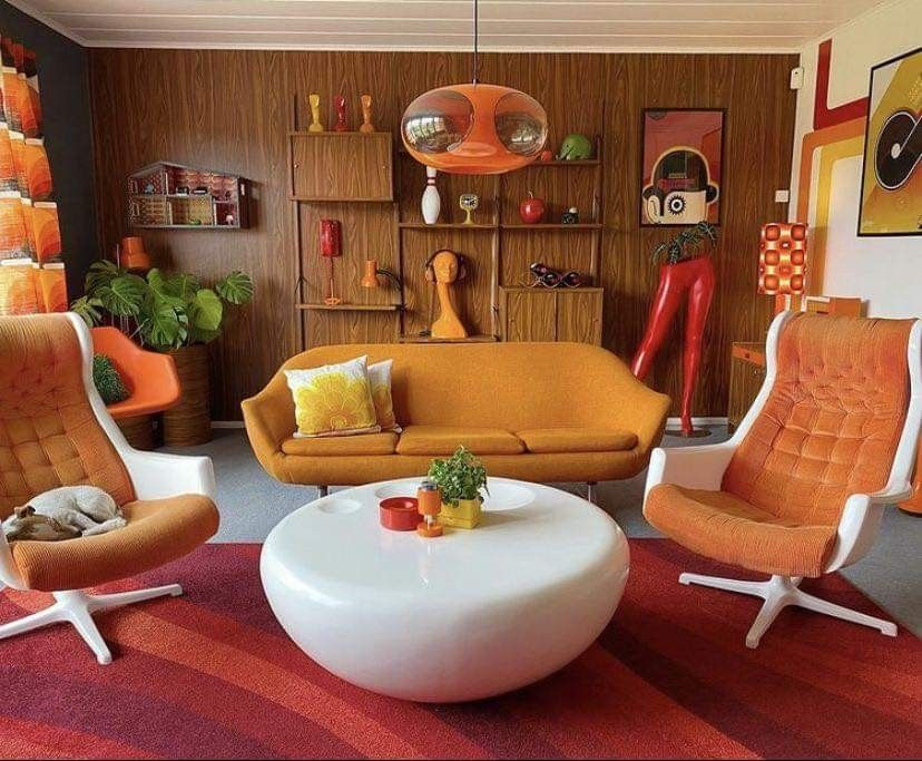 Eye-level view of a retro living room with vibrant furniture