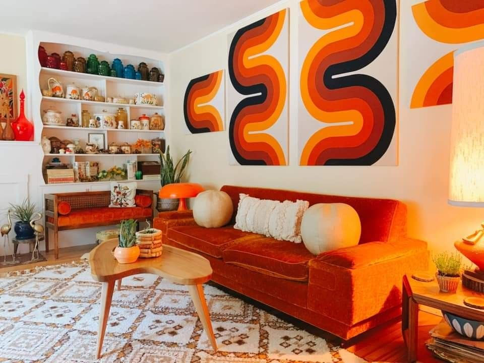 Close-up view of a vintage patterned throw pillow on a couch