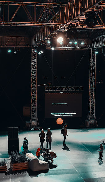group-of-people-standing-on-stage-111008