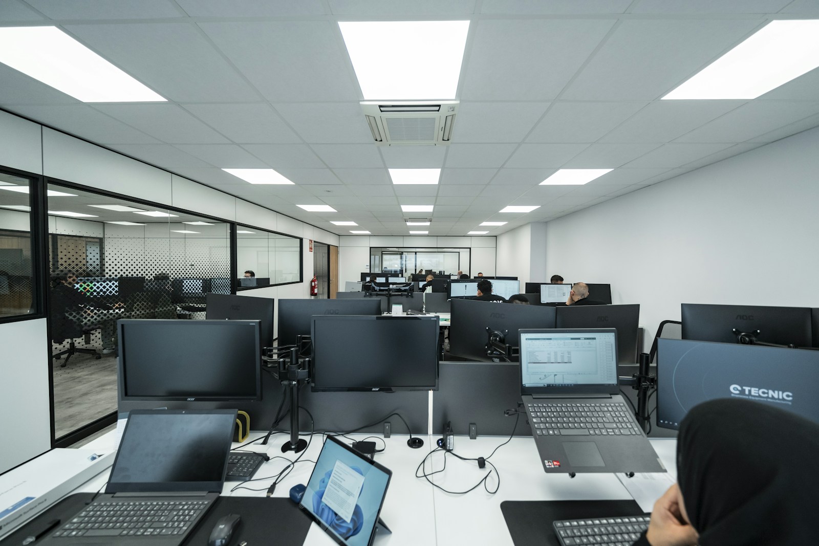 Employees working in a modern technical office