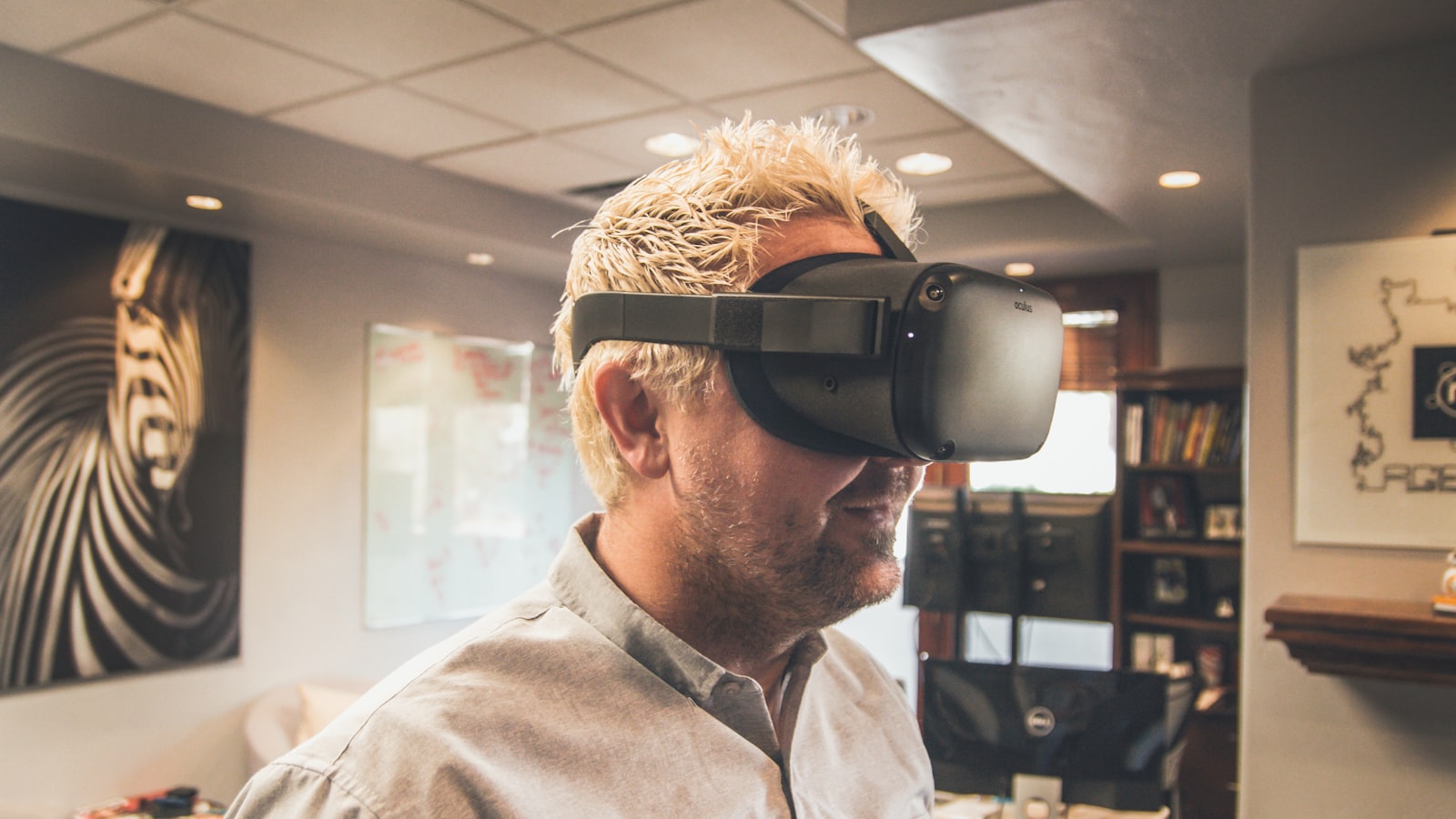 Person using a virtual reality headset while evaluating a spatial customer experience