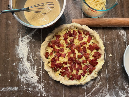Quiche fully prepared before baking.