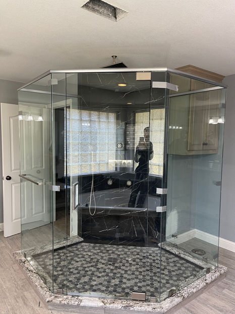 360 frameless shower, with a header