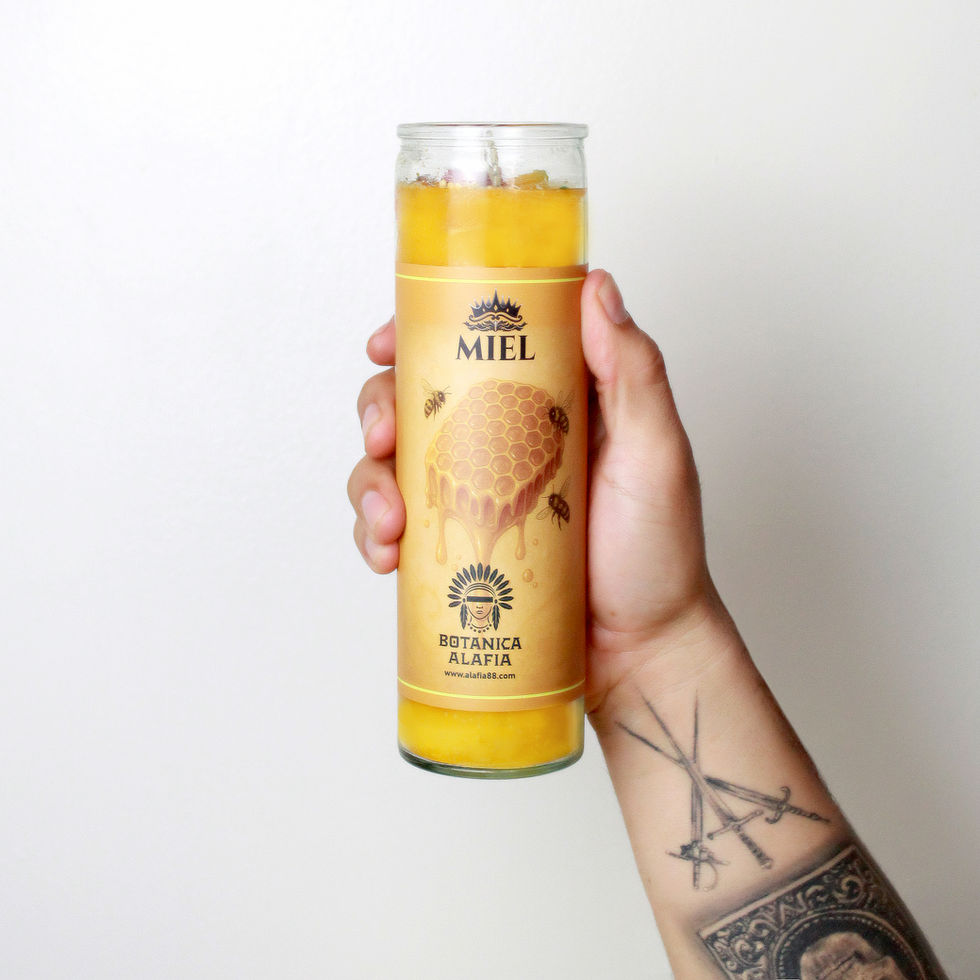 Vela esotérica de miel de Botanica Alafia para rituales de amor y atracción