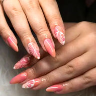 Almond acrylic nail extensions with a peach pink base and raised 3D white abstract swirl nail art, custom designed at 312 Nails & Spa salon in River North, Downtown Chicago.