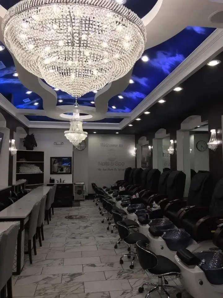 Modern luxury interior of 312 Nails & Spa in River North Chicago with manicure tables and pedicure spa chairs for bridal parties and corporate events