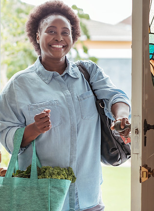 smaller black woman shopping hutterstock