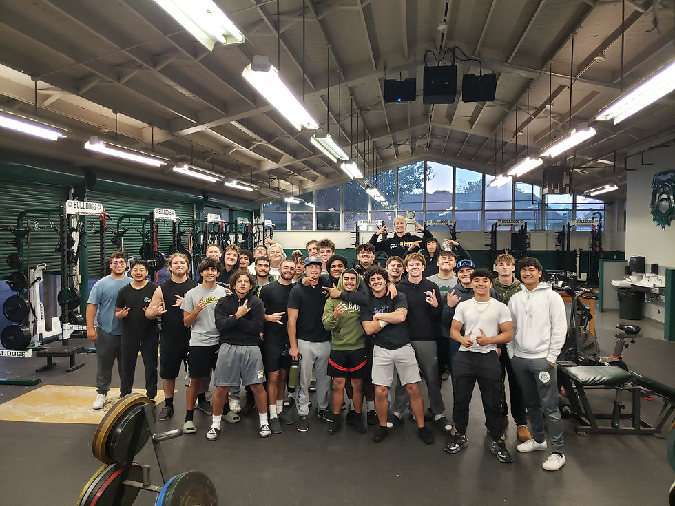 Tracy High Football after a training session in their weight room.