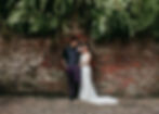 bride and groom in a courtyard in New Orleans
