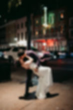 elopement couple kissing under street light in New Orleans