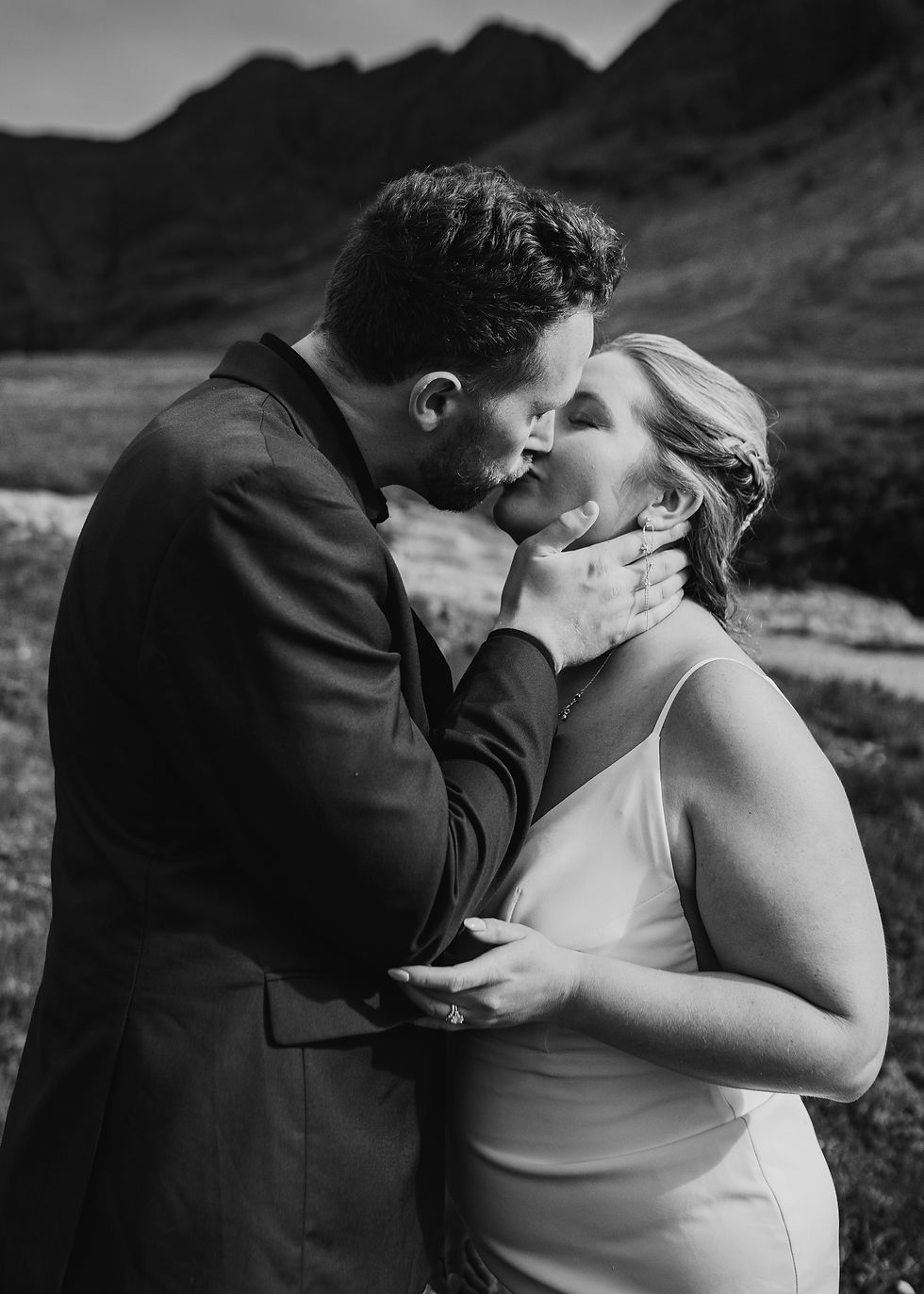 bride and groom kissing