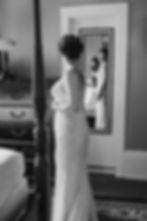 elopement bride viewing herself in the mirror