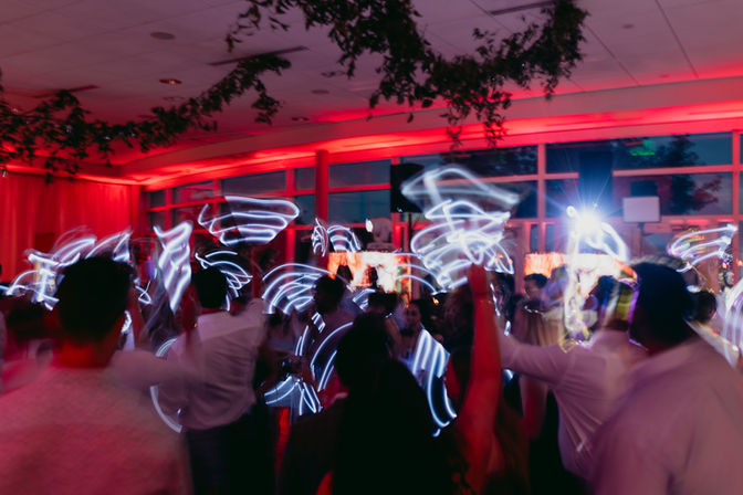 Light wands at a wedding reception at Phipp's Conservatory and Botanical Gardens
