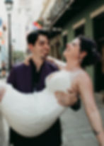 Groom carrying his bride in New Orleans