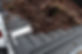 Yard debris on top of the Tail Bridge tailgate gap cover