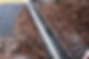 Tail Bridge in the upright position that shows no debris in the tailgate gap