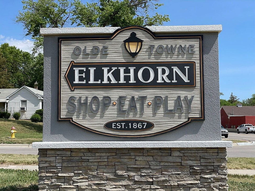 Olde Towne Elkhorn sign: Shop Eat Play, Est. 1867