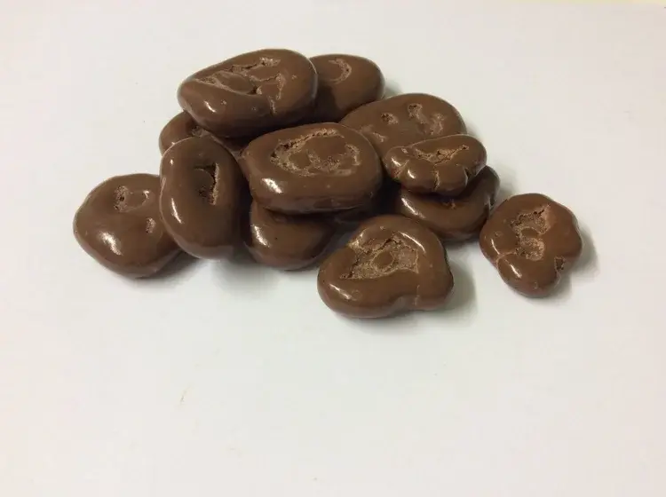 Milk chocolate coated banana slices