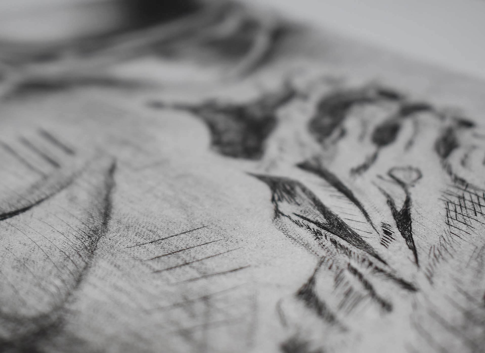 A close-up image of a copperplate intaglio print showing a robot holding a heart, with fine line details visible.