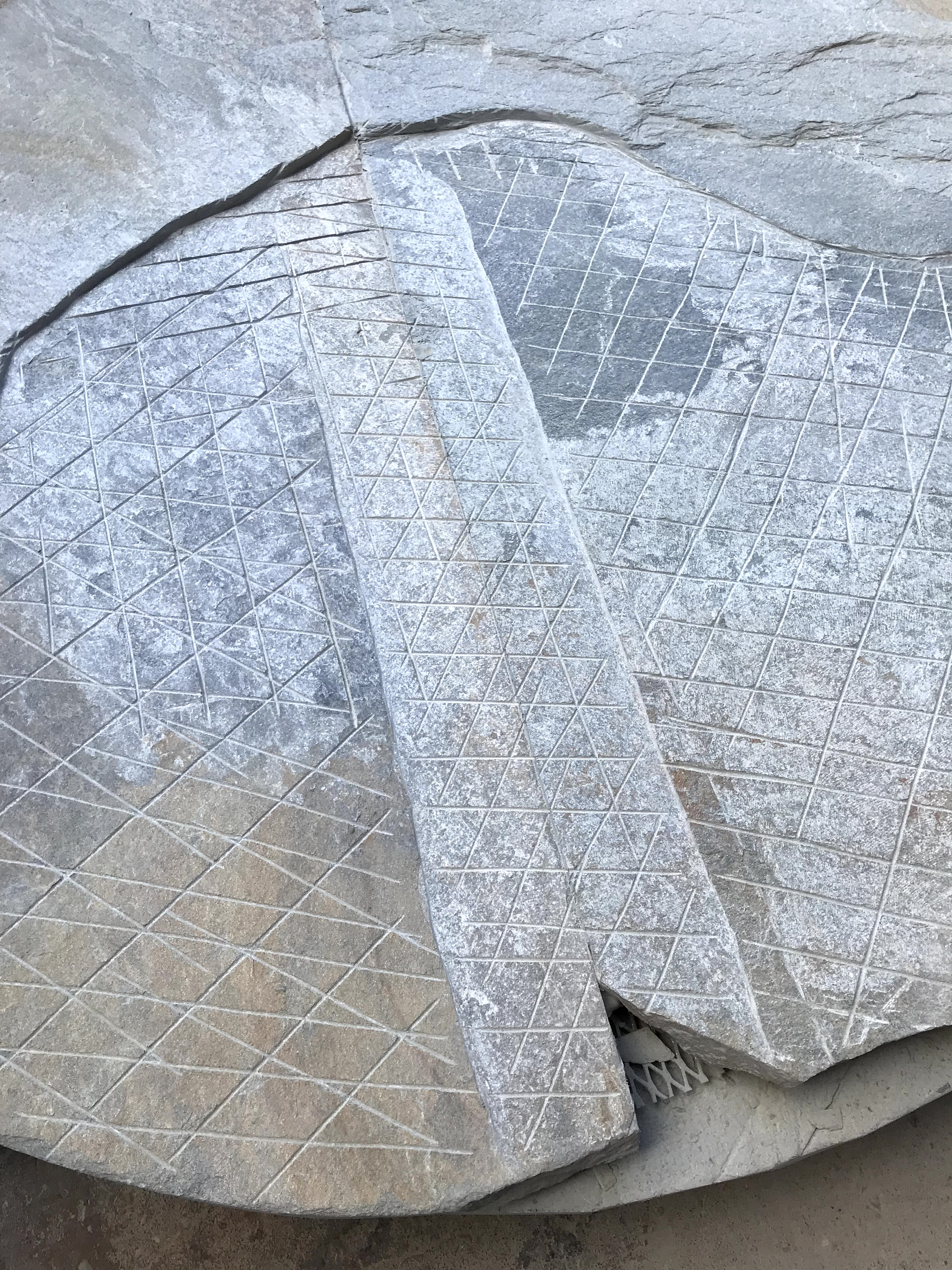 scoring and cutting stone