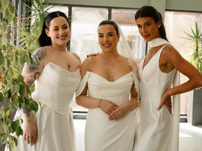 Three brides all wearing different wedding dresses at Manchester Hall. Dresses available at The Corner Atelier, a bridal boutique based in Manchester.