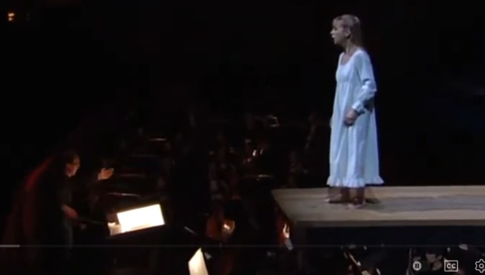 Natalie Dessay walks over the Met Orchestra